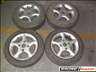 Suzuki alufelni + gumi 155/70R13